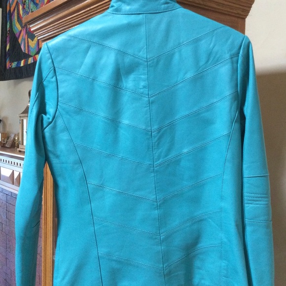 Turquoise leather jacket worn once. - Picture 2 of 4